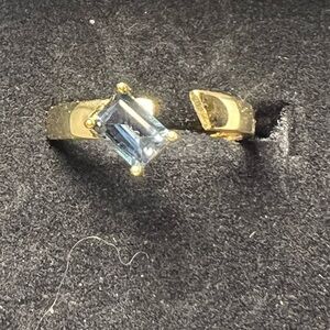 Size 8.25 gold vermeil over sterling silver blue topaz split ring